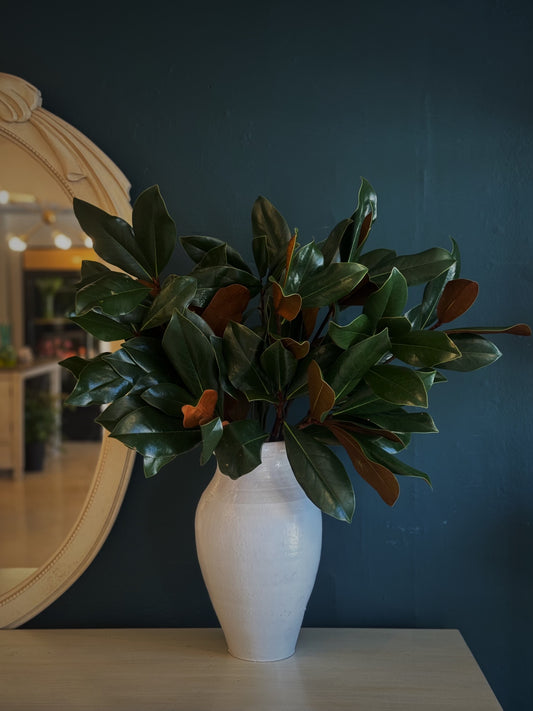 2 Magnolia Bunch in a white urn 