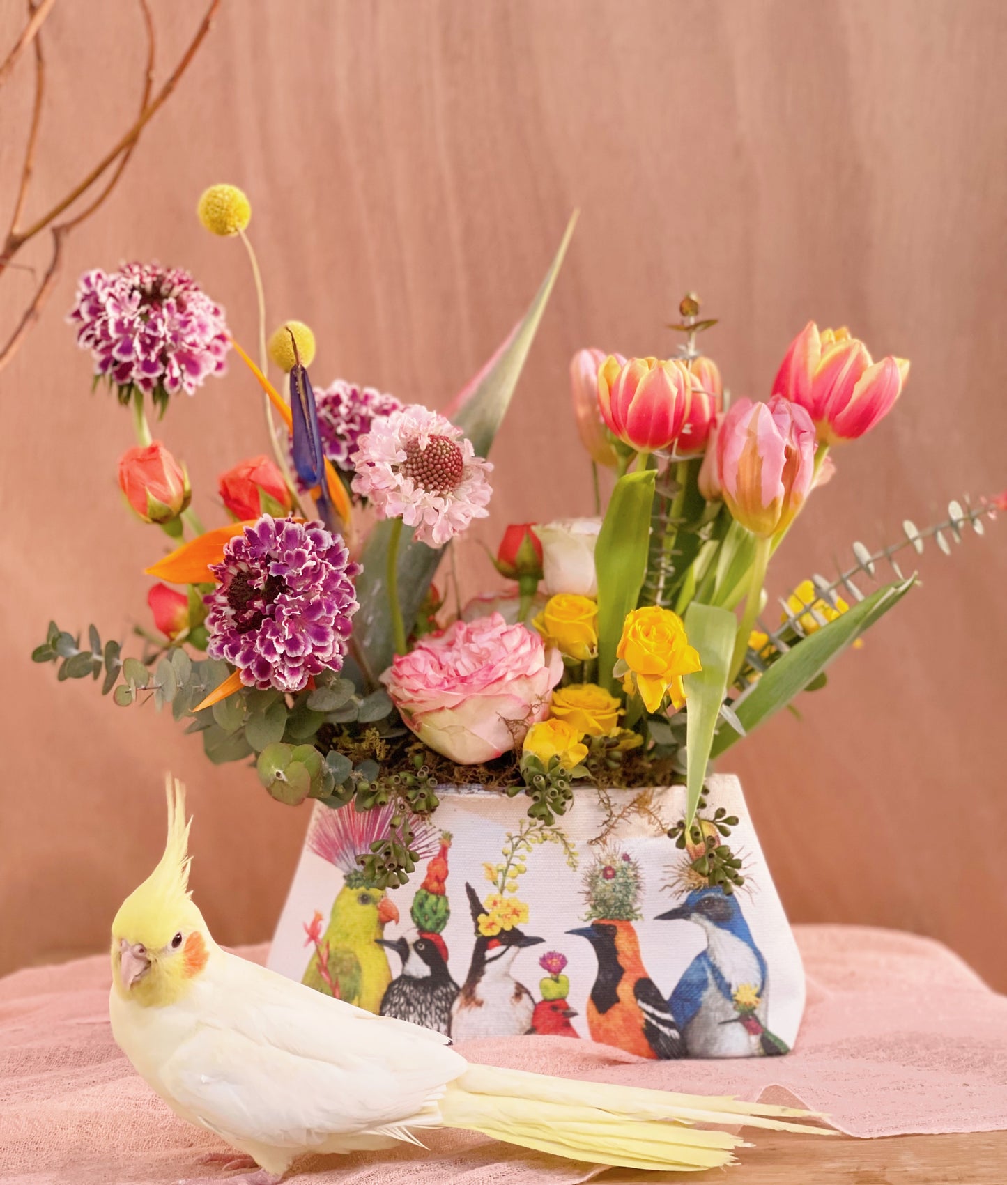 cosmetic bag full of blooms birds on front